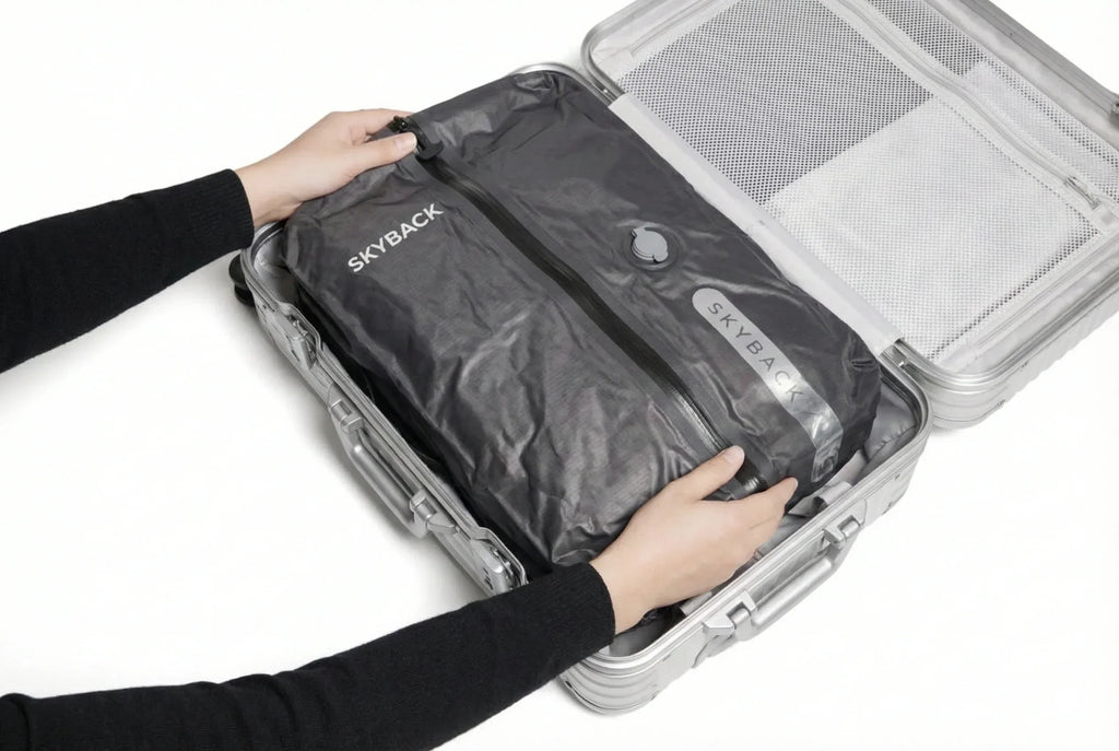 Vacuum compression travel bag